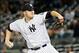 Sep 25, 2013; Bronx, NY, USA; New York Yankees starting pitcher Phil Hughes (65) pitches during the first inning against the Tampa Bay Rays at Yankee Stadium. Mandatory Credit: Anthony Gruppuso-USA TODAY Sports