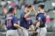 CHICAGO, IL - AUGUST 9: Glen Perkins #15, Justin Morneau #33 and Joe Mauer #7 of the Minnesota Twins celebrate a win over the Chicago White Sox in Game One of a doubleheader at U.S. Cellular Field on August 9, 2013 in Chicago, Illinois. The Twins defeate
