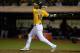 OAKLAND, CA - SEPTEMBER 19: Josh Reddick #16 of the Oakland Athletics hits an RBI double scoring Brandon Moss #37 during the fouth inning against the Minnesota Twins at O.co Coliseum on September 19, 2013 in Oakland, California. (Photo by Thearon W. Hen