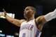 Apr 15, 2013; Oklahoma City, OK, USA; Oklahoma City Thunder guard Russell Westbrook (0) puts up a defensive front against the Sacramento Kings during the first half at Chesapeake Energy Arena. Mandatory Credit: Mark D. Smith-USA TODAY Sports
