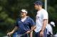 Jul 30, 2013; Foxborough, MA, USA; New England Patriots head coach Bill Belichick (left) talks with tight end Rob Gronkowski (right) during training camp at the practice fields of Gillette Stadium. Mandatory Credit: Stew Milne-USA TODAY Sports