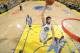 OAKLAND, CA - APRIL 28: Andrew Bogut #12 of the Golden State Warriors dunks against the Denver Nuggets in Game Four of the Western Conference Quarterfinals during the 2013 NBA Playoffs on April 28, 2013 at Oracle Arena in Oakland, California. NOTE TO USER