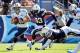 Sep 22, 2013; Nashville, TN, USA; Tennessee Titans quarterback Jake Locker (10) scrambles from the pocket against the San Diego Chargers during the second half at LP Field. The Titans beat the Chargers 20-17. Mandatory Credit: Don McPeak-USA TODAY Sports