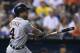 KANSAS CITY, MO - SEPTEMBER 6: Omar Infante #4 of the Detroit Tigers hits a three-run double in the fifth inning against the Kansas City Royals at Kauffman Stadium on September 6, 2013 in Kansas City, Missouri. (Photo by Ed Zurga/Getty Images)