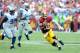 LANDOVER, MD - SEPTEMBER 22: Robert Griffin III #10 of the Washington Redskins runs with the ball in the fourth quarter against the Detroit Lions at FedExField on September 22, 2013 in Landover, Maryland. (Photo by Greg Fiume/Getty Images)