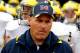 SOUTH BEND, IN - SEPTEMBER 11: Head coach Rich Rodriguez of the Michigan Wolverines waits with his team before entering the field for a game against the Notre Dame Fighting Irish at Notre Dame Stadium on September 11, 2010 in South Bend, Indiana. Michigan