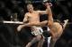 Jan 26, 2013; Chicago, IL, USA; Donald Cerrone (white shorts) fights against Anthony Pettis (black shorts) during UFC on FOX 6 at the United Center. Mandatory Credit: David Banks-USA TODAY Sports