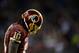 LANDOVER, MD - JANUARY 06: Robert Griffin III #10 of the Washington Redskins reacts during their NFC Wild Card Playoff Game against the Seattle Seahawks at FedExField on January 6, 2013 in Landover, Maryland. (Photo by Patrick McDermott/Getty Images)