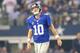 ARLINGTON, TX - SEPTEMBER 08: Quarterback Eli Manning #10 of the New York Giants reacts in the first quarter against the Dallas Cowboys in the first half on September 8, 2013 at AT&T Stadium in Arlington, Texas. (Photo by Ronald Martinez/Getty Images)