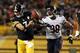 Sep 22, 2013; Pittsburgh, PA, USA; Pittsburgh Steelers quarterback Ben Roethlisberger (7) fumbles the ball as he runs from Chicago Bears defensive end Corey Wootton (98) during the second half at Heinz Field. The Bears won the game, 40-23. Mandatory Credi