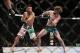 Apr 27, 2013; Newark, NJ, USA; Leonard Garcia (white shorts) competes against Cody McKenzie (green and black shorts) during UFC 159 at the Prudential Center. Mandatory Credit: Brad Penner-USA TODAY Sports