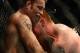 August 11, 2012; Denver, CO, USA; Jake Shields (left) fights Ed Herman (right) during UFC 150 at the Pepsi Center. Mandatory Credit: Ron Chenoy-USA TODAY Sports