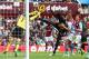 BIRMINGHAM, ENGLAND - SEPTEMBER 28: Yaya Toure of Manchester City has his shot at goal blocked by Brad Guzan of Aston Villa during the Barclays Premier League match between Aston Villa and Manchester City at Villa Park on September 28, 2013 in Birmingham