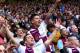 BIRMINGHAM, ENGLAND - SEPTEMBER 28: Aston Villa fans celebrate the win during the Barclays Premier League match between Aston Villa and Manchester City at Villa Park on September 28, 2013 in Birmingham, England. (Photo by Jan Kruger/Getty Images)