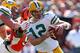 CINCINNATI, OH - SEPTEMBER 22: Aaron Rodgers #12 of the Green Bay Packers runs with the ball during the NFL game against Cincinnati Bengals at Paul Brown Stadium on September 22, 2013 in Cincinnati, Ohio. (Photo by Andy Lyons/Getty Images)