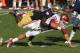 SOUTH BEND, IN - SEPTEMBER 28: Prince Shembo #55 of the Notre Dame Fighting Irish brings down Blake Bell #10 of the Oklahoma Sooners at Notre Dame Stadium on September 28, 2013 in South Bend, Indiana. (Photo by Jonathan Daniel/Getty Images)