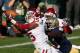 SOUTH BEND, IN - SEPTEMBER 28: Zack Sanchez #15 of the Oklahoma Sooners tries for an interception on pass intended for DaVaris Daniels #10 of the Notre Dame Fighting Irish at Notre Dame Stadium on September 28, 2013 in South Bend, Indiana. (Photo by Jona