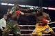 Sep 28, 2013; Montreal, Quebec, Canada; Adonis Stevenson (yellow trunks) and Tavoris Cloud (cammo trunks) box during their light-heavyweight WBC world championship bout at the Bell Centre. Mandatory Credit: Eric Bolte-USA TODAY Sports
