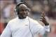 Sep 7, 2013; Louisville, KY, USA; Louisville Cardinals head coach Charlie Strong reacts on the side line during the second half of play against the Eastern Kentucky Colonels at Papa John's Cardinal Stadium. Louisville defeated Eastern Kentucky 44-7. Mand