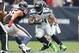 Sep 29, 2013; Houston, TX, USA; Houston Texans linebacker Brian Cushing (56) prepares to tackle Seattle Seahawks running back Marshawn Lynch (24) in the second quarter at Reliant Stadium. Mandatory Credit: Matthew Emmons-USA TODAY Sports