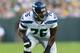 Aug 23, 2013; Green Bay, WI, USA; Seattle Seahawks offensive tackle Russell Okung (76) during the game against the Green Bay Packers at Lambeau Field. Seattle won 17-10. Mandatory Credit: Jeff Hanisch-USA TODAY Sports
