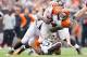 CLEVELAND, OH - SEPTEMBER 29: Defensive end Desmond Bryant #92 and linebacker Barkevious Mingo #51 of the Cleveland Browns sack quarterback Andy Dalton #14 of the Cincinnati Bengals during the second half at FirstEnergy Stadium on September 29, 2013 in Cl