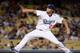 LOS ANGELES, CA - SEPTEMBER 27: Clayton Kershaw #22 of the Los Angeles Dodgers pitches against the Colorado Rockies during the first inning at Dodger Stadium on September 27, 2013 in Los Angeles, California. (Photo by Harry How/Getty Images)