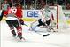 Sep 28, 2013; Chicago, IL, USA; Washington Capitals goalie Braden Holtby (70) saves a shot from Chicago Blackhawks right wing Ben Smith (28) during the second period at United Center. Mandatory Credit: Dennis Wierzbicki-USA TODAY Sports