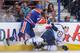 EDMONTON, CANADA - SEPTEMBER 23: Ben Eager #55 of the Edmonton Oilers shoves Adam Pardy #2 of the Winnipeg Jets off his feet during a preseason NHL game at Rexall Place on September 23, 2013 in Edmonton, Alberta, Canada. (Photo by Derek Leung/Getty Images