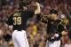 PITTSBURGH, PA - SEPTEMBER 21: Jason Grilli #39 of the Pittsburgh Pirates celebrates with catcher Russell Martin #55 after the final out of the game against the Cincinnati Reds on September 21, 2013 at PNC Park in Pittsburgh Pennsylvania. The Pirates de