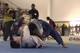 With Gonzaga's butt in the air and not on Maia's trapped leg, Maia has space to kick his right leg free and over Gonzaga's left arm for a triangle choke.