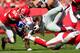 KANSAS CITY, MO - SEPTEMBER 29: Running back David Wilson #22 of the New York Giants is tackled by inside linebacker Akeem Jordan #55 and cornerback Dunta Robinson #21 of the Kansas City Chiefs during the game at Arrowhead Stadium on September 29, 2013 i