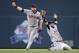 MINNEAPOLIS, MN - SEPTEMBER 29: Jason Kipnis #22 and Nick Swisher #33 of the Cleveland Indians celebrate a win of the game against the Minnesota Twins on September 29, 2013 at Target Field in Minneapolis, Minnesota. The Indians defeated the Twins 5-1 and