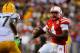 LINCOLN, NE - SEPTEMBER 7: Quarterback Tommy Armstrong Jr. #4 of the Nebraska Cornhuskers eyes linebacker Alan Howze #37 of the Southern Miss Golden Eagles during their game at Memorial Stadium on September 7, 2013 in Lincoln, Nebraska. Nebraska defeated