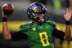 EUGENE, OR - SEPTEMBER 28: Quarterback Marcus Mariota #8 of the Oregon Ducks warms up before the game against the California Golden Bears at Autzen Stadium on September 28, 2013 in Eugene, Oregon. (Photo by Steve Dykes/Getty Images)