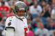 FOXBORO, MA - SEPTEMBER 22: Josh Freeman #5 of the Tampa Bay Buccaneers reacts after an incomplete pass in the second half against the Tampa Bay Buccaneers at Gillette Stadium on September 22, 2013 in Foxboro, Massachusetts. (Photo by Jim Rogash/Getty Im
