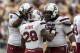 Sep 28, 2013; Orlando, FL, USA; South Carolina Gamecocks guard A.J. Cann (right) congratulates South Carolina Gamecocks running back Mike Davis (28) for scoring a touchdown during the second half of the game at Bright House Networks Stadium. Mandatory Cre