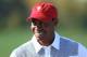 DUBLIN, OH - OCTOBER 01: Tiger Woods of the U.S. Team waits on the practice ground prior to the start of The Presidents Cup at the Muirfield Village Golf Club on October 1, 2013 in Dublin, Ohio. (Photo by Andy Lyons/Getty Images)