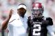COLLEGE STATION, TX - APRIL 13: Head coach Kevin Sumlin of the Texas A&M Aggies chats with his quarterback Johnny Manziel #2 before the Maroon & White spring football game at Kyle Field on April 13, 2013 in College Station, Texas. (Photo by Scott Haller