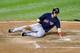 BALTIMORE, MD - SEPTEMBER 28: Stephen Drew #7 of the Boston Red Sox slides into home plate and scores in the fifth inning against the Baltimore Orioles at Oriole Park at Camden Yards on September 28, 2013 in Baltimore, Maryland. (Photo by Greg Fiume/Get
