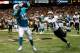 NEW ORLEANS, LA - SEPTEMBER 30: Charles Clay #42 of the Miami Dolphins catches a touchdown pass over Chris Carr #31 of the New Orleans Saints at the Mercedes-Benz Superdome on September 30, 2013 in New Orleans, Louisiana. (Photo by Chris Graythen/Getty