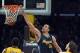 May 8, 2012; Los Angeles, CA, USA; Denver Nuggets center JaVale McGee (34) dunks the ball as Los Angeles Lakers forward Pau Gasol (16) and center Andrew Bynum (17) and Nuggets forward Corey Brewer (13) watch during game five of the 2012 Western Conference
