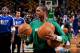 BOSTON, MA - JANUARY 24: Rajon Rondo #9 of the Boston Celtics smiles during warm-ups before a game against the New York Knicks on January 24, 2013 at the TD Garden in Boston, Massachusetts. NOTE TO USER: User expressly acknowledges and agrees that, by do