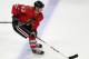Viktor Svedberg casts a big shadow on the IceHogs blue line.