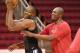 HOUSTON, TX - JULY 13, 2013: Legend Hakeem Olajuwon works out with Dwight Howard of the Houston Rockets on August 13, 2013 at The Toyota Center Houston, Texas. NOTE TO USER: User expressly acknowledges and agrees that, by downloading and or using this ph