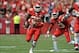 Sep 15, 2013; Kansas City, MO, USA; Kansas City Chiefs strong safety Eric Berry (29) runs for yardage after recovering a fumble from Dallas Cowboys running back Lance Dunbar (25) (not pictured) during the second half at Arrowhead Stadium. The Chiefs won 1