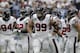 HOUSTON, TX - SEPTEMBER 15: J.J. Watt #99 of the Houston Texans and the defensive line during a break at Reliant Stadium on September 15, 2013 in Houston, Texas. (Photo by Bob Levey/Getty Images)