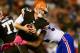 Oct 3, 2013; Cleveland, OH, USA; Cleveland Browns quarterback Brandon Weeden (3) is sacked by Buffalo Bills defensive end Mario Williams (94) during the third quarter at FirstEnergy Stadium. Mandatory Credit: Andrew Weber-USA TODAY Sports