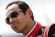 LONG POND, PA - JULY 6 : Helio Castroneves of Brazil, driver of the #3 Hitachi Team Penske stands on the grid during qualifying for the Pocono INDYCAR 400 at Pocono Raceway on July 5, 2013 in Long Pond, Pennsylvania. (Photo by Jeff Zelevansky/Getty Images
