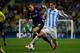 MALAGA, SPAIN - MARCH 13: Francisco R. Alarcon alias Isco (R) of Malaga CF competes for the ball with Nicolas Otamendi (L) of FC Porto during the UEFA Champions League Round of 16 second leg match between Malaga CF and FC Porto at La Rosaleda Stadium on M
